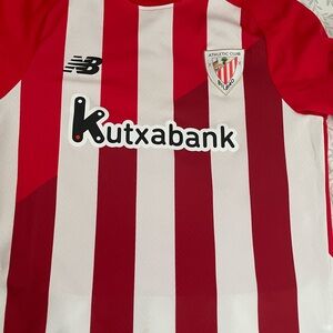 New Balance Red and White Striped Jersey